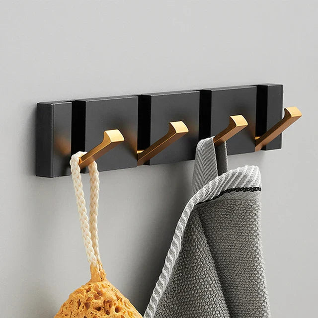 Crochet mural pliable en acier inoxydable design minimaliste & gain de place pour tout intérieur